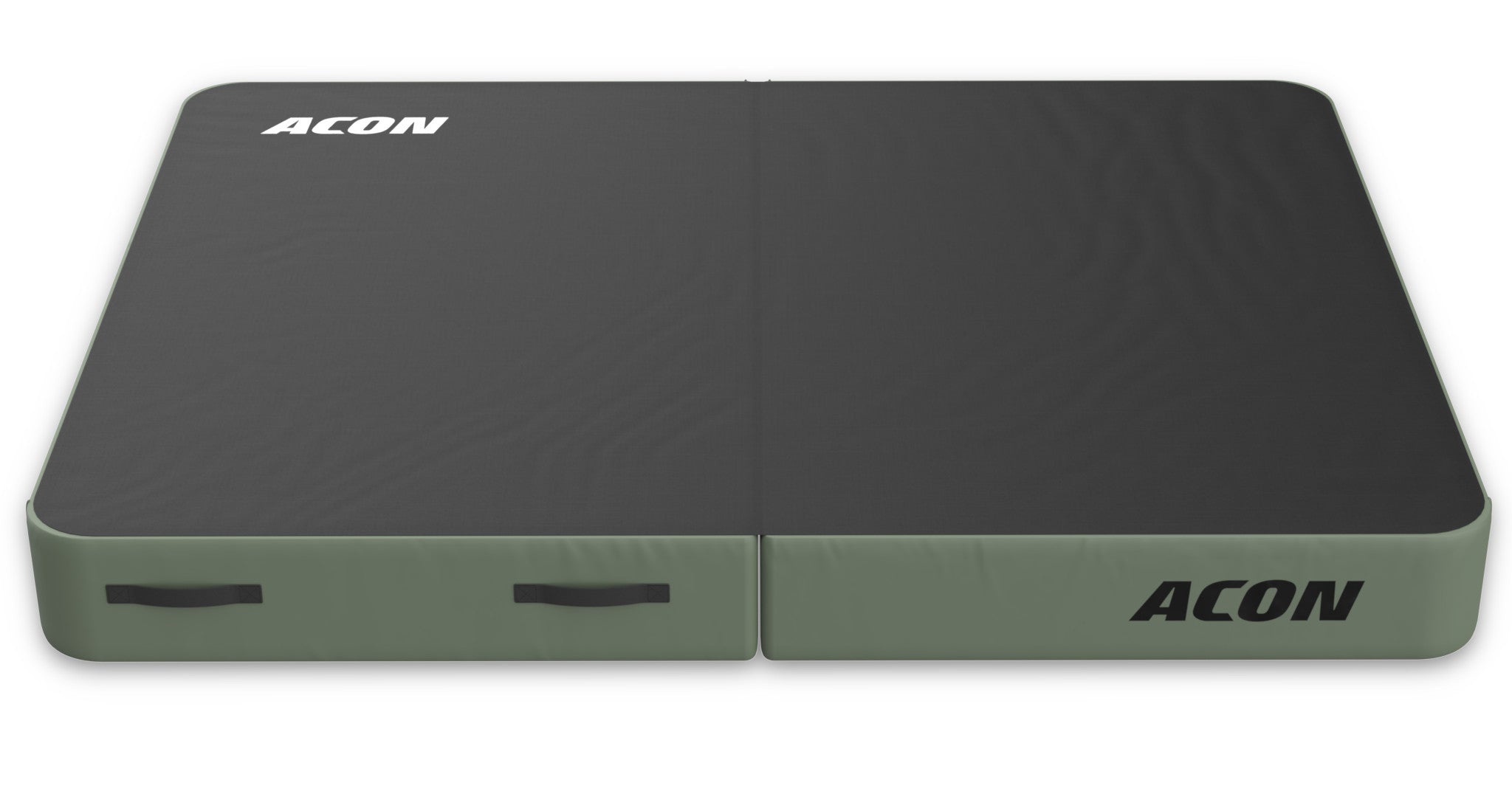 Taitettava alastulopatja voimisteluun ja temppuiluun valkoista taustaa vasten. Patjan pinta on musta ja reunat ovat vihreitä ACON-logolla varustettuna