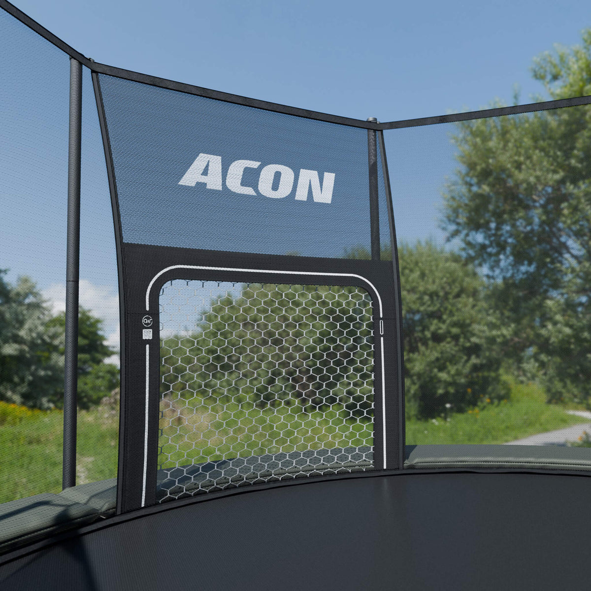 ACON Air Jalkapallomaali ACON Air pyöreään trampoliiniin asennettuna ulkona.