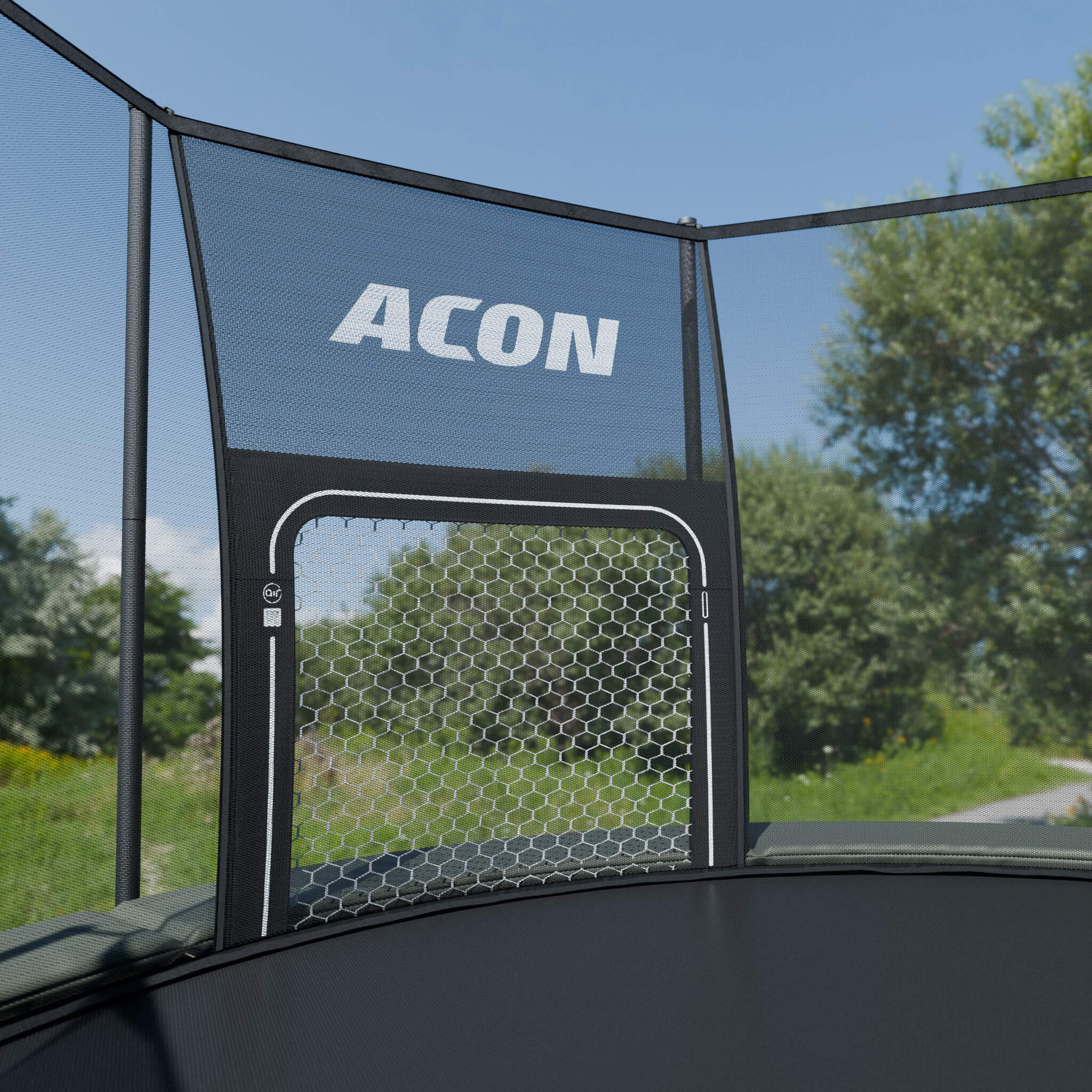 ACON Air Jalkapallomaali ACON Air pyöreään trampoliiniin asennettuna ulkona.
